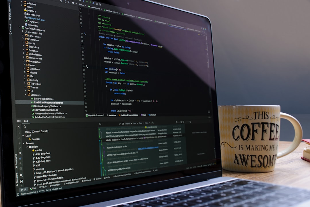 Laptop screen displaying code with a coffee mug.